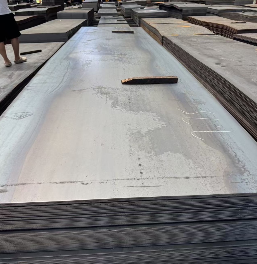 9672500e-f258-409c-924a-0e3e3e2f22f0_hot‑rolled‑carbon‑steel‑plate‑stack‑factory‑stockyard.jpg